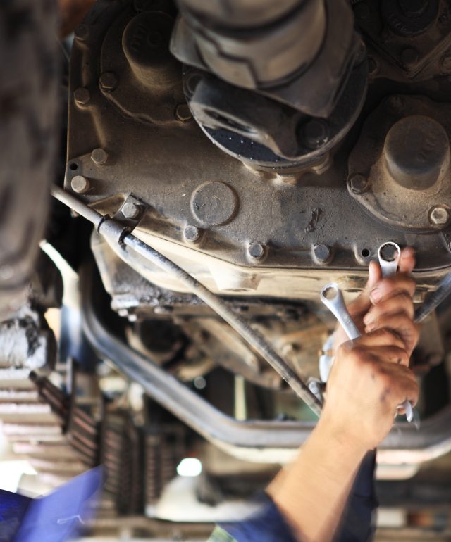 Motor Mechanic below a Heavy goods Vehicle